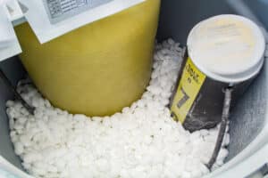 Water softener filled with salt tablets. Buying a Home Water Filtration System - JB Water Well