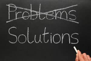 Problems and solutions. Crossing out problems and writing solutions on a blackboard. Water Well Problems in Oklahoma and How to Prevent Them - JB Water Well